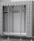 Heavy Duty Portable Canvas Wardrobe With Spacious Hanging Rail And Sturdy Shelves For Roomy Bedroom Closet Storage Organizer With Zero Drama Fabric Cover Setup featuring metal frame and patterned fabric.