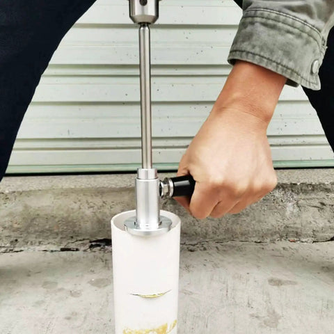 Using Inside Pipe Cutter Kit For PVC And ABS Pipes With Diamond Grit Wheel Adjustable Cutting Depth Handle Included Ideal For Impact Drivers And Clean Inside Cuts on a white pipe
