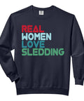 Real Women Love Sledding Sweatshirt For Adults Cozy Winter Gear with multicolored text on black fleece