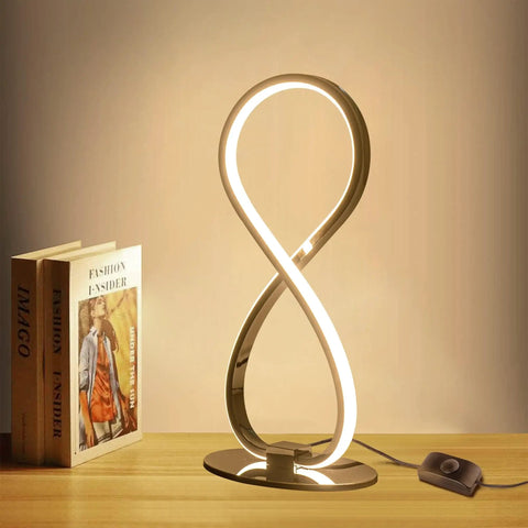 Eight Shape Spiral Led Table Lamp With Stepless Dimmable Brightness Warm White Light Modern Silver Nightstand Desk Lamp beside books