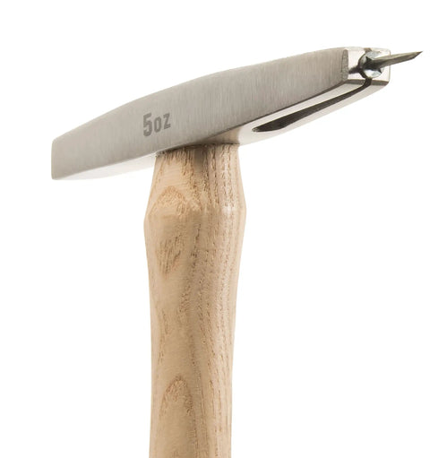Close-up of Sure Strike Tack Hammer with 5 oz forged steel head, magnetic face, and hickory wood handle.