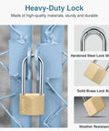 Keyed Padlock Waterproof Solid Brass Lock 2.6 Inch With Keys For Sheds Storage Units featuring hardened steel shackle on fence.