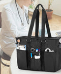 Workhorse Nurse Bag With 15.6 Inch Laptop Sleeve Fold Flat Bottom Pad for Safe Gear shown with tools in pockets, black color