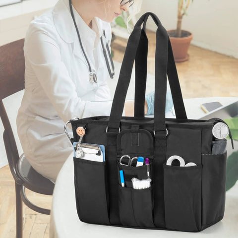 Workhorse Nurse Bag With 15.6 Inch Laptop Sleeve Fold Flat Bottom Pad for Safe Gear shown with tools in pockets, black color