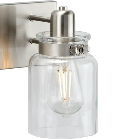 Calhoun Collection Clear Glass Farmhouse Bath Vanity Light Three Light Brushed Nickel Vintage Inspired Fixture close-up view
