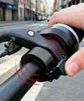 All In One Bike Chain Kit for 6 7 8 Speed 126 Links with Chain Tool, Master Links, and Bicycle Bell in use on city street
