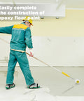Worker using 9 Inch Spiked Roller Kit For Self Leveling Concrete And Epoxy Floors Includes 3 Spiked Rollers Roller Stand And Shoes Pro Grade Cement Floor Leveling Tool For Smooth Epoxy And Concrete Finish Yellow on floor
