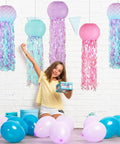 Colorful Jellyfish Paper Lanterns Set Of 6 In Pink Purple And Blue Hanging Lanterns with child and balloons for ocean party decor