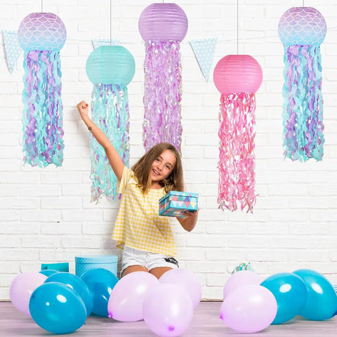 Colorful Jellyfish Paper Lanterns Set Of 6 In Pink Purple And Blue Hanging Lanterns with child and balloons for ocean party decor