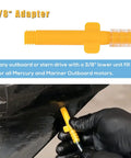 Lower Unit Gear Lube Pump For Standard Quart Bottles Fits Mercury And Mariner Outboards Plus Yamaha Nissan Tohatsu Honda Evinrude Outboards Includes One Suction Tube And Dual Adapters Three Eighths Inch And Eight Millimeter Aluminum Adapters in use, showing 3/8-inch yellow adapter.