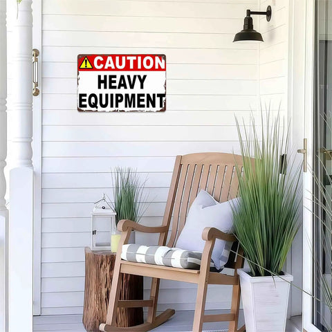 Caution Heavy Equipment Safety Sign With Funny Aluminum Wall Decor, 8x12 Inch, displayed on white porch wall