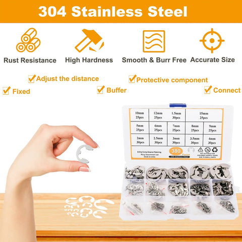 Hand holding E clip beside open box of 380 Pcs 304 Stainless Steel E Clip Circlip External Retaining Ring Assortment Kit With 14 Sizes
