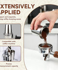 Hand using Stainless Steel 51mm Coffee Dosing Cup For Espresso Machines to pour coffee grounds into a portafilter, barista tool.