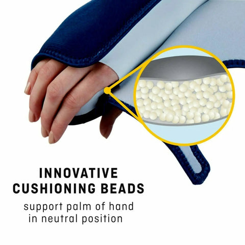Close-up of Night Wrist Support for Carpal Tunnel Relief with cushioning beads in neutral hand position, showing adjustable sleeve.