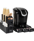 Two Piece Coffee Pod Drawer And Cup Condiment Organizer Set With Ten Compartments And Three Drawers in use with coffee machine