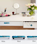 4 Pack Aqua Aquamarine Blue Water Cabinet Pulls, 3.75 Inch Hole Center, displayed on a white desk with makeup items.