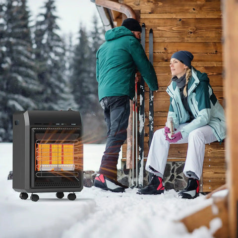 Outdoor Propane Heater Portable 6000 To 18000 BTU With Three Settings For Patio Cordless Tip Over Protection next to a ski cabin