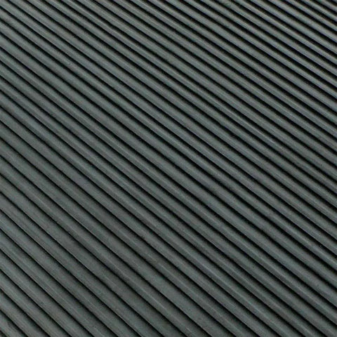 Textured surface of Non Slip Outdoor Rubber Ramp Cleat Floor Mat For Inclined Walkways One Eighth Inch Thick 3 Ft By 4 Ft