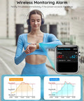 Woman using WiFi Thermometer Hygrometer With E Ink Display Real Time Indoor Temperature And Humidity Sensor App Alerts.