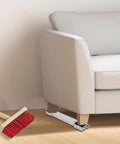 Heavy Duty Extendable Appliance Mover Dolly For Fridge Washer Dryer Rolling Base With 24 Wheels And Brakes Adjustable From 17 To 28 Inches White, seen under a sofa.