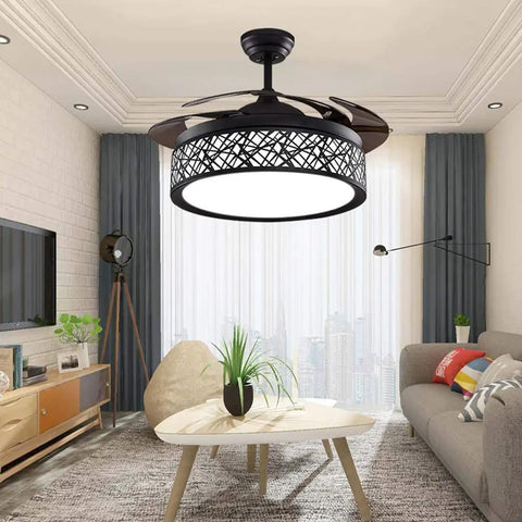 42 Inch Retractable Ceiling Fan With LED Light And Remote Control, black finish, in modern living room setup, blades retracted