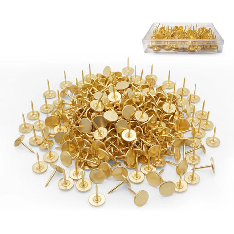 Reliable Heavy Duty Gold Thumb Tacks Boss Level Needlepoint Push Pins For Walls And Cork Boards Gonna Stay Put Without Bending Premium Steel Home Decor Fixtures in a pile with a storage container