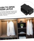 Black push to open door latch with wardrobe cabinet, part of Push To Open Cabinet Latch Kit Four Pack With Rebound Tech.