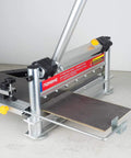 Beast Of A 13 Inch Laminate Flooring And Siding Cutter With Clamp and Sliding Extension Table cutting wood material