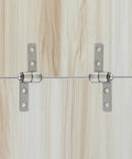 Two carbon steel 360° torque hinges with mounting plates and screws on wood surface