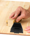 Person sanding wooden surface with 12 Piece Modular Wrench Rack Organizer Tray For Wrenches Space Saving Plastic Garage Organizer For Tool Storage