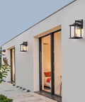 House exterior with 2 Pack Black Exterior Wall Light Fixtures With Dusk To Dawn Sensor, E26 Base Socket, Clear Glass, Waterproof Outdoor Lanterns