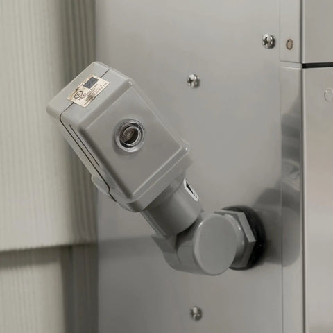 Plug-In Photocell Lighting Sensor for Outdoor Transformers Auto Dusk-To-Dawn On Off mounted on a wall for landscape lighting control