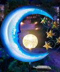 Solar Powered Outdoor Lights Moon And Star Garden Stake Decor for Pathways and Patio, featuring lit night glow design.