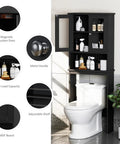 Over The Toilet Storage Cabinet For Bathroom, Black Space Saver With Two Tempered Glass Doors, Wood Construction CARB P2 Compliant Moisture Resistant Open Shelf And Enclosed Cabinet installed above toilet.