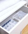 Clear White 10 Pack 1.3 Qt Small Storage Bins With Lids, Stackable Plastic Containers, shown in a drawer organizing items