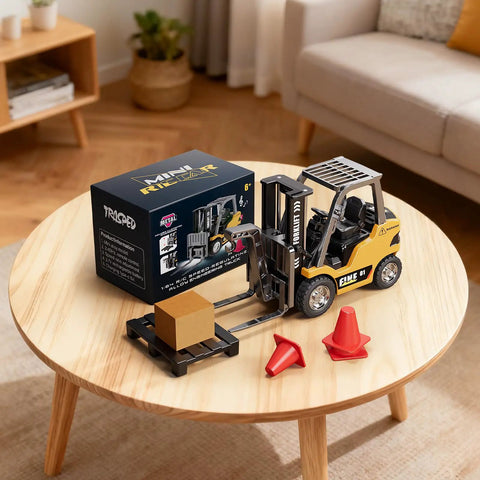Mini RC Forklift Toy With Remote Control 2.4GHz 2 In 1 Lift Fork And Hook Truck next to box on table