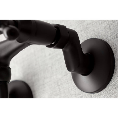 Close-up of a dark metal faucet arm, resembling the design of Two Handle Wall Mount Bathroom Faucet in Polished Nickel with Drip Free Ceramic Disc Cartridge, Adjustable Center from Three and a Half Inches to Eight and a Half Inches, 1.2 GPM Flow, Solid Brass Build, Sleek Dope Bath Upgrade.