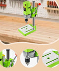 Gitohoni Mini Milling Machine Precision Table Top Electric Drill Press And Micro Rotary Tool For Craftwork on a workbench.