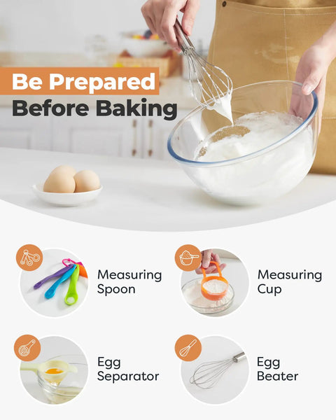 Person using egg beater to whisk mixture in glass bowl, part of 700-Piece Cake Decorating Kit With Springform Pans, Cake Turntable.