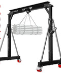 Beefy 3 Ton Gantry Crane 6600 Lb Portable Shop Hoist with smooth manual trolley lifting pipes, black steel build.