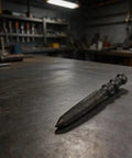Heavy Duty Center Punch Locator For Metal Drilling High Hardness Spot Punch Tool Perfect For Wood Aluminum Iron Glass Precise Positioning Fitter Chisel B on a workbench.