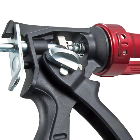Close-up of Caulking Tool Dual Thrust Caulk Gun For One Tenth Gallon Ten Ounce With Auto Flow Stop and 360 Degree Rotating Handle.