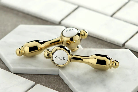 Four Inch Centerset Bathroom Faucet In Polished Brass With Lifetime Drip Free Ceramic Cartridge Brass Construction faucet handles
