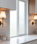 YS.ESUDSI Vintage Wall Sconces with White Fabric Shade Hardwired E26 Base installed on kitchen wall beside window.