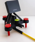 Rock Solid Golf Launch Monitor Stand With Quick Height Adjustments From Quarter Inch To Two Inches, featuring adjustable mount and leveler.