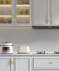Modern kitchen with white cabinets featuring 30 Pack 3 Inch Matte Gold Kitchen Cabinet Handles And Drawer Pulls For Bathrooms And Dressers Airplane Style Cabinet Pulls With Smooth Edges And Easy Install Hardware.