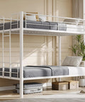 Heavy Duty Twin Over Twin Metal Bunk Bed With Sturdy Steel Ladder High Safety Guardrails Built Tough For Kids Teens Adults Dorm Room Extra Thick Steel Slats Keep It Rock Solid And Totally Squeak Free White, viewed from the side with gray bedding.