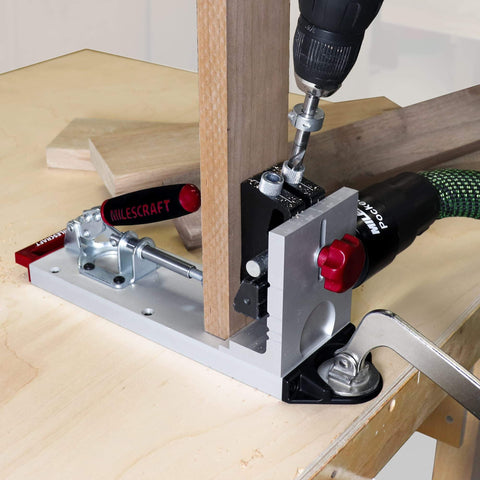 Close-up of Pocket Hole Jig 400 Self Clamping Kit With Adjustable Bushing Blocks and Drill Guides in use on wooden board