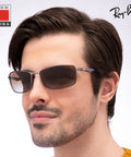 Man wearing polarized rectangle shape sunglasses for men with grey gradient brown lenses street ready modern edge frame everyday wear that slays formal and casual styles includes eyewear kit.