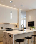 3 Pack Modern Pendant Lights For Kitchen Island With Glittering Crystal Bubbles, 6500K Daylight Brushed Nickel Hanging Fixtures in a modern kitchen.